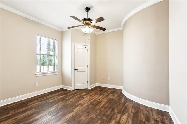 unfurnished room featuring baseboards, ornamental molding, a ceiling fan, and dark wood-style flooring