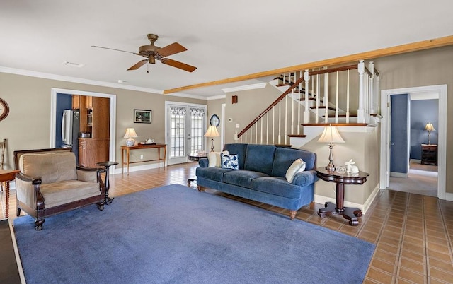 155 Greencrest Dr, Slidell, LA 70458 - tiled living room with baseboards, ornamental molding, ceiling fan, and stairway