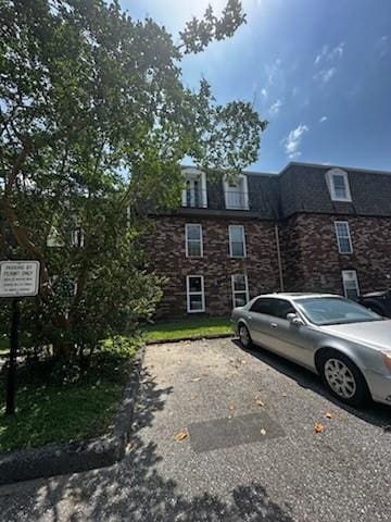 6320 Riverside Dr Unit 350, Metairie, LA 70003 - view of front of home with mansard roof
