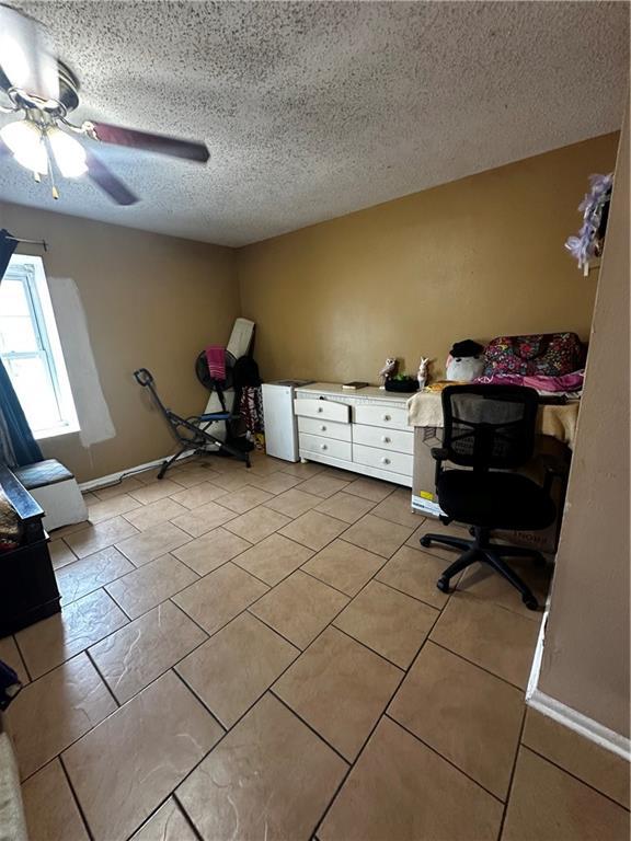 6320 Riverside Dr Unit 350, Metairie, LA 70003 - unfurnished office featuring light tile patterned floors, a ceiling fan, and a textured ceiling