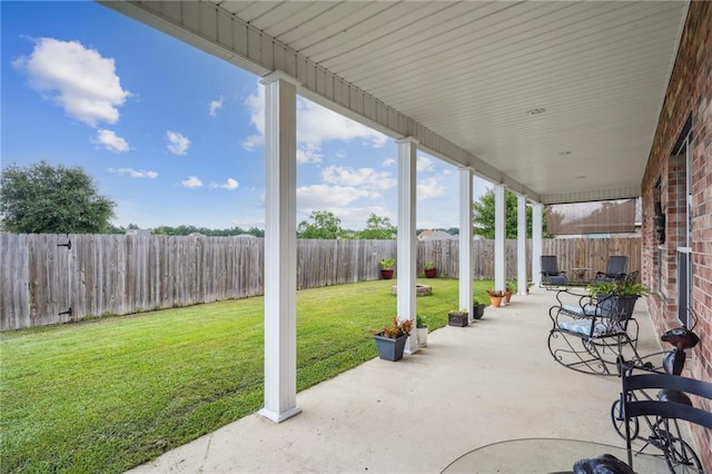 view of patio with a fenced backyard
