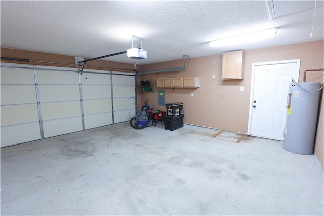 garage featuring water heater and a garage door opener