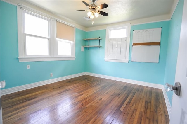 3220 48th St, Metairie, LA 70001 - unfurnished room with visible vents, baseboards, ceiling fan, and hardwood / wood-style flooring
