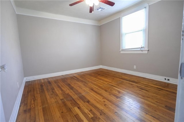3220 48th St, Metairie, LA 70001 - spare room with a ceiling fan, baseboards, visible vents, and hardwood / wood-style flooring