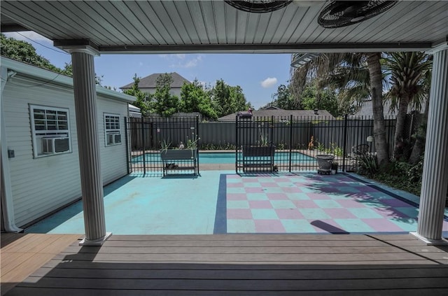 3220 48th St, Metairie, LA 70001 - wooden deck with a fenced in pool, a fenced backyard, and cooling unit
