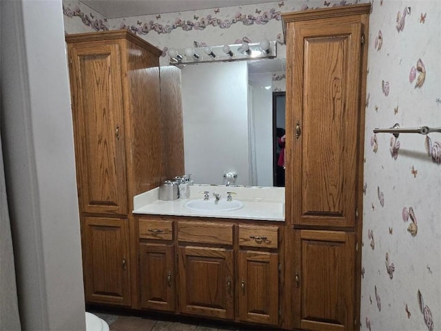 1905 Ridgefield Dr, La Place, LA 70068 - bathroom featuring wallpapered walls and vanity