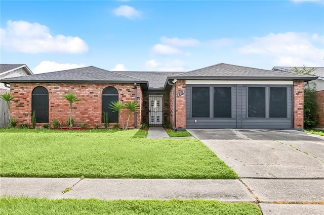 7717 Doyle Ct, New Orleans, LA 70126 - single story home featuring brick siding, french doors, a shingled roof, and a front lawn
