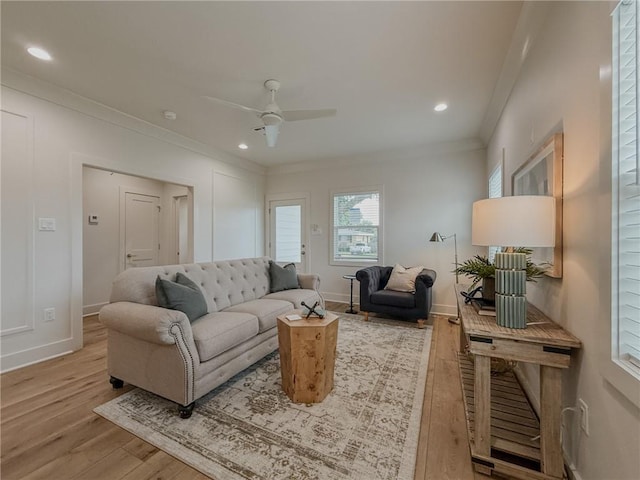 2412 Mississippi Ave, Metairie, LA 70003 - living area featuring light wood finished floors, crown molding, ceiling fan, and recessed lighting