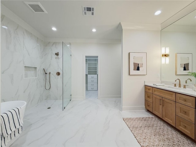 2412 Mississippi Ave, Metairie, LA 70003 - bathroom with recessed lighting, a marble finish shower, marble finish flooring, vanity, and a soaking tub
