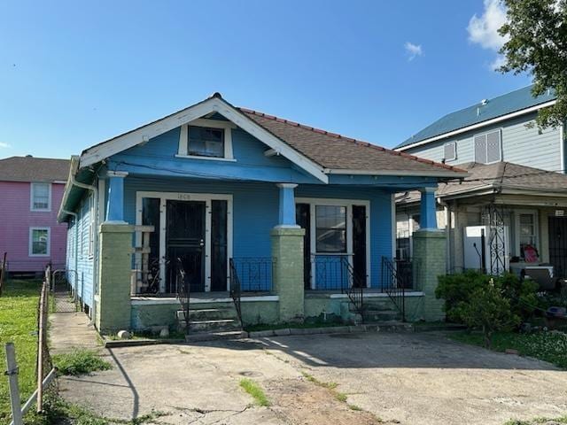 bungalow-style home with covered porch