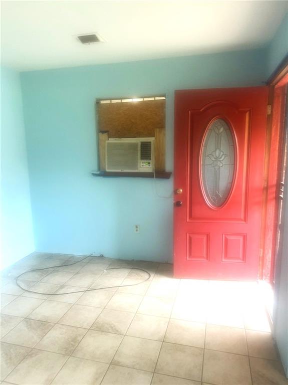 3076 Elgin St, Baton Rouge, LA 70805 - tiled entrance foyer with cooling unit