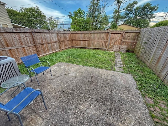 308 Ormond Meadows Dr Unit B, Destrehan, LA 70047 - view of yard with a patio, central AC, a gate, and a fenced backyard