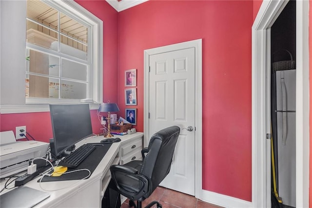 609 W Dakota St, Hammond, LA 70401 - office area with dark tile patterned floors and baseboards