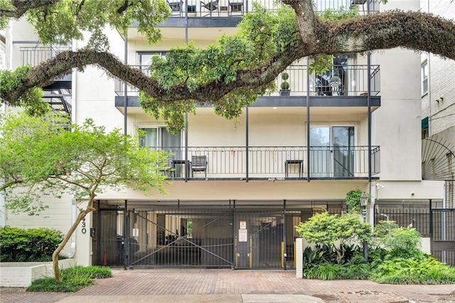 view of building exterior with fence