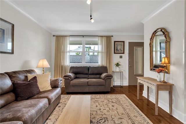 living room with crown molding, baseboards, and dark wood-style floors
