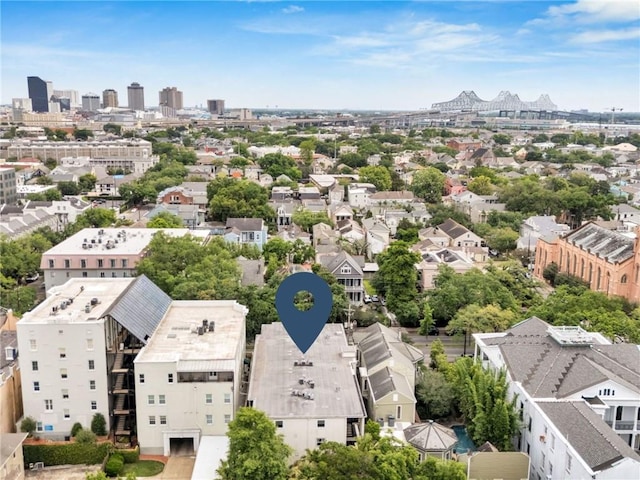drone / aerial view featuring a city view