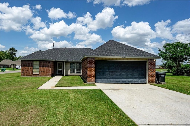 11257 Abbey Ln, Denham Springs, LA 70726 - ranch-style home featuring a garage, a front lawn, driveway, and a shingled roof