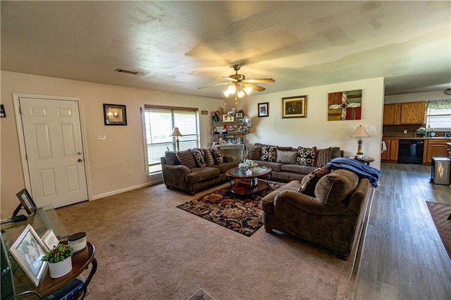 11257 Abbey Ln, Denham Springs, LA 70726 - living room featuring visible vents, a ceiling fan, and baseboards
