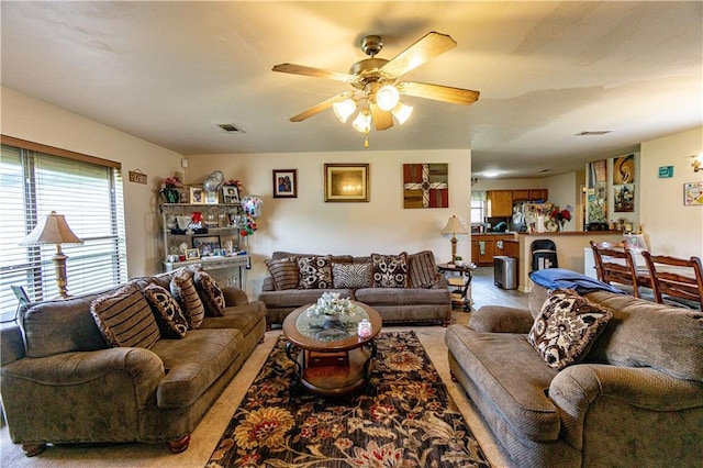 11257 Abbey Ln, Denham Springs, LA 70726 - living area featuring visible vents and ceiling fan