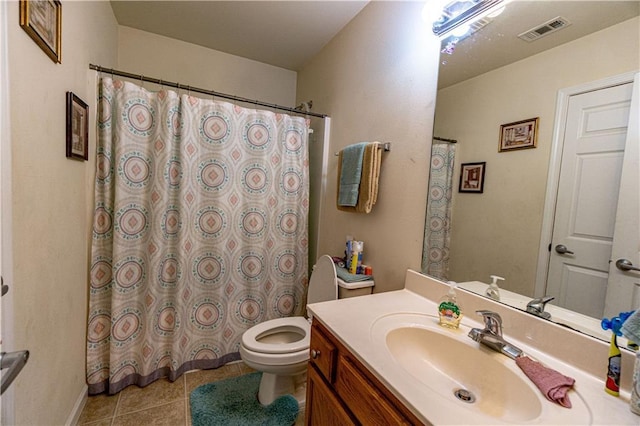 11257 Abbey Ln, Denham Springs, LA 70726 - bathroom with tile patterned flooring, vanity, toilet, a shower with shower curtain, and visible vents