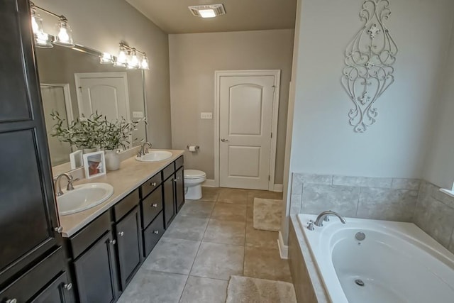 full bath featuring a sink, tile patterned flooring, a bath, and visible vents