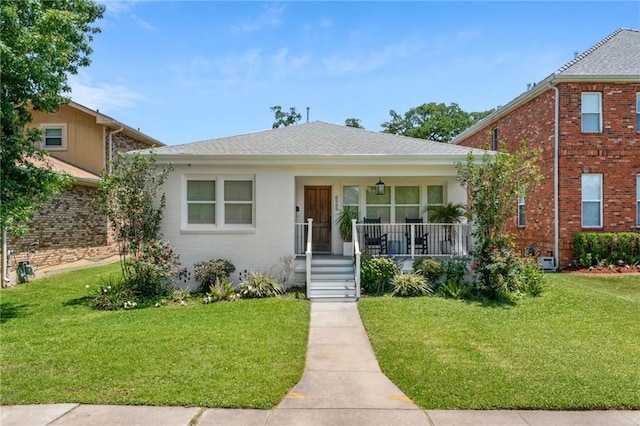 6565 Milne Blvd, New Orleans, LA 70124 - bungalow-style home featuring covered porch, a front yard, brick siding, and roof with shingles