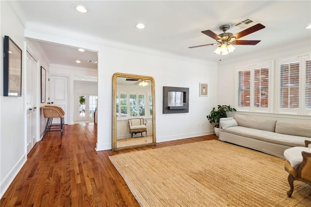 6565 Milne Blvd, New Orleans, LA 70124 - living area with ceiling fan, crown molding, wood finished floors, recessed lighting, and baseboards
