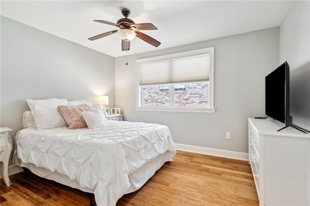 6565 Milne Blvd, New Orleans, LA 70124 - bedroom featuring light wood-style floors, baseboards, and ceiling fan