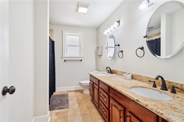 6565 Milne Blvd, New Orleans, LA 70124 - bathroom featuring baseboards, toilet, double vanity, and curtained shower