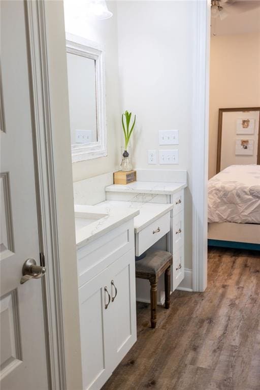 109COUSHATTACIRCLE Coushatta Cir, Madisonville, LA 70447 - bathroom featuring vanity, wood finished floors, and ceiling fan