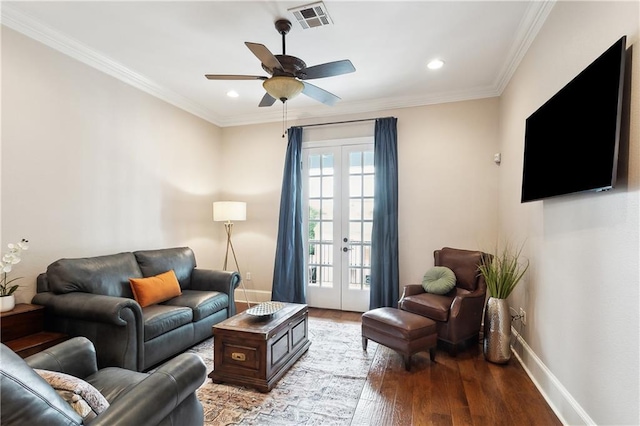 living area featuring french doors, a ceiling fan, baseboards, wood finished floors, and visible vents