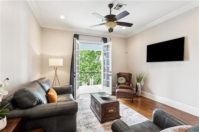 living room featuring baseboards, ceiling fan, recessed lighting, and wood finished floors