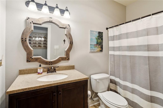 613 Del Sol Pass, Covington, LA 70433 - bathroom with toilet, vanity, and a shower with shower curtain
