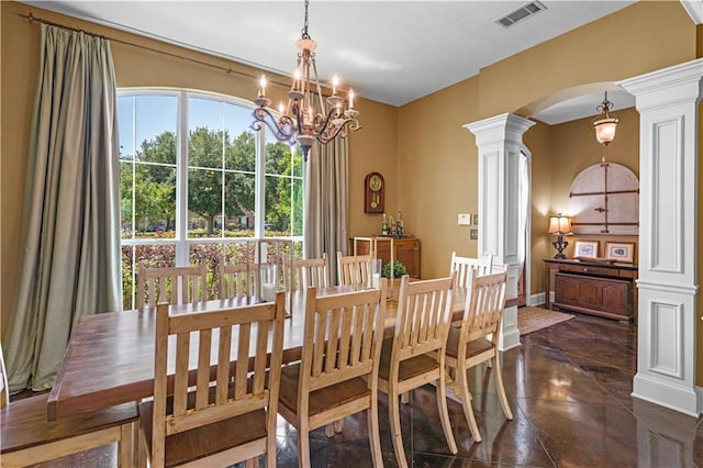 364 Winchester Cir, Mandeville, LA 70448 - dining area featuring arched walkways, decorative columns, an inviting chandelier, and visible vents