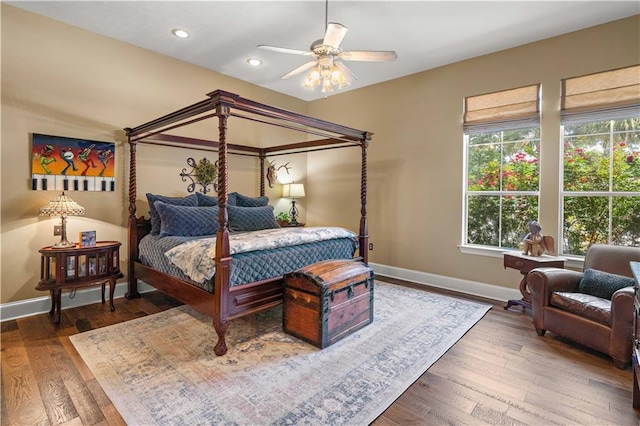 364 Winchester Cir, Mandeville, LA 70448 - bedroom with baseboards, ceiling fan, wood-type flooring, and recessed lighting