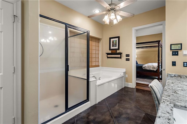 364 Winchester Cir, Mandeville, LA 70448 - bathroom with ceiling fan, a garden tub, a stall shower, tile patterned floors, and connected bathroom