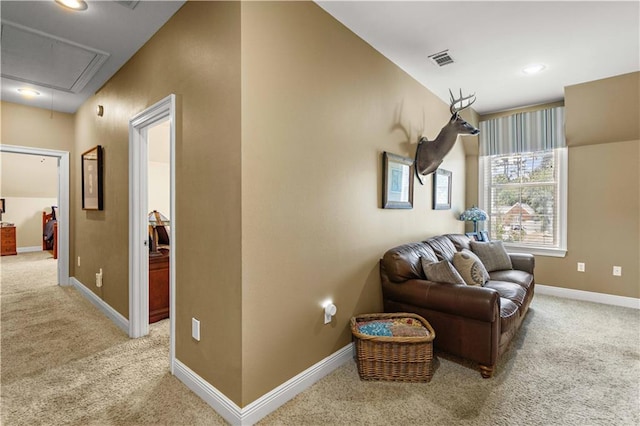 364 Winchester Cir, Mandeville, LA 70448 - living area with baseboards, visible vents, light carpet, and attic access