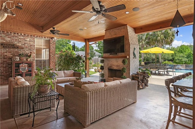 364 Winchester Cir, Mandeville, LA 70448 - view of patio with ceiling fan, an outdoor pool, and an outdoor living space with a fireplace