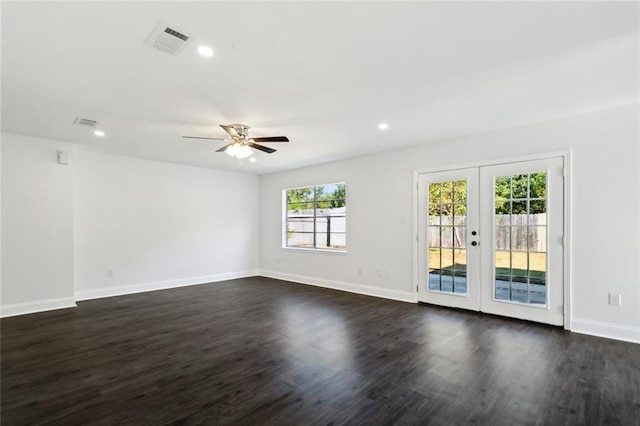 314 Raleigh Dr, Slidell, LA 70460 - spare room with french doors, dark wood-style flooring, ceiling fan, and recessed lighting