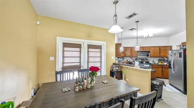 dining room with visible vents