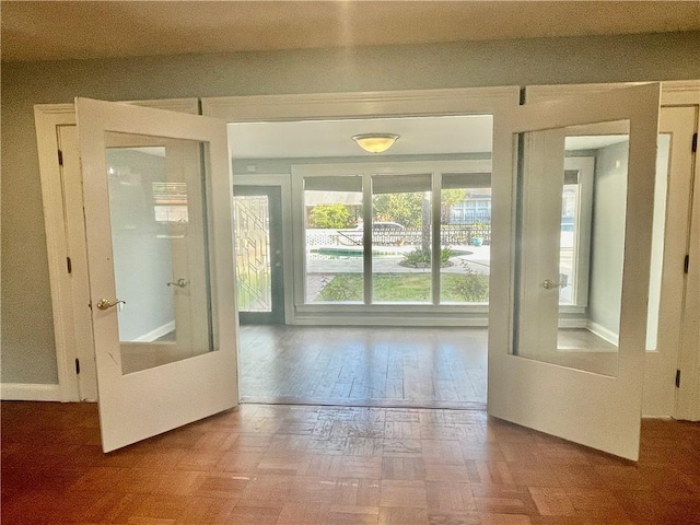 doorway featuring wood finished floors