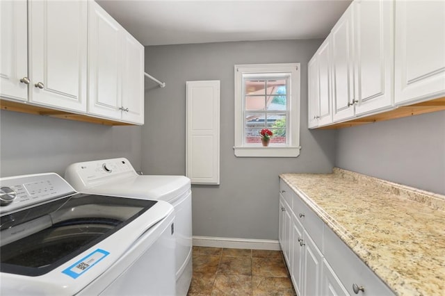 19 Rail St, New Orleans, LA 70124 - laundry room featuring washer and dryer, baseboards, and cabinet space