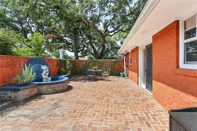 19 Rail St, New Orleans, LA 70124 - fenced backyard featuring a patio and outdoor dining space