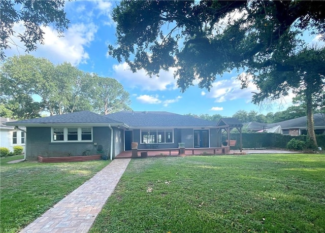 single story home featuring a patio and a front lawn