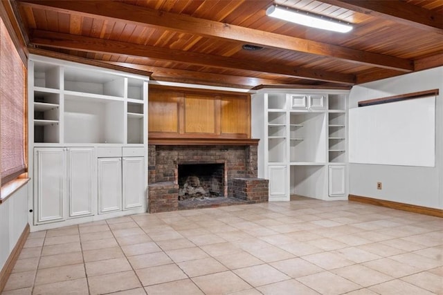unfurnished living room featuring a fireplace, light tile patterned floors, wooden ceiling, and beamed ceiling