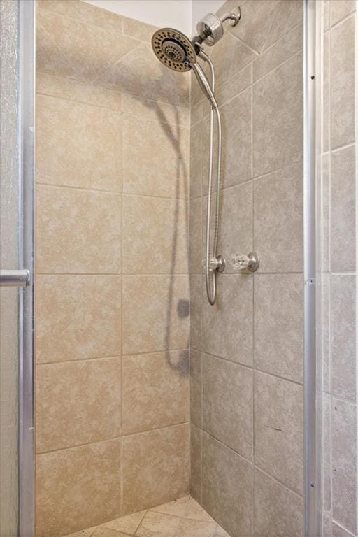 bathroom featuring a stall shower
