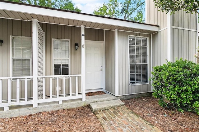 entrance to property with a porch