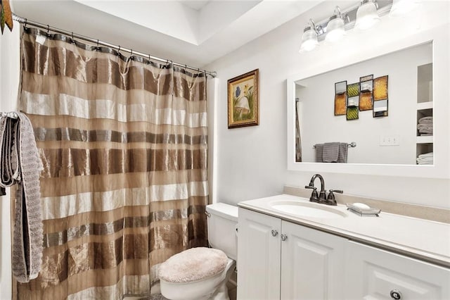 full bathroom with vanity, toilet, and a shower with curtain