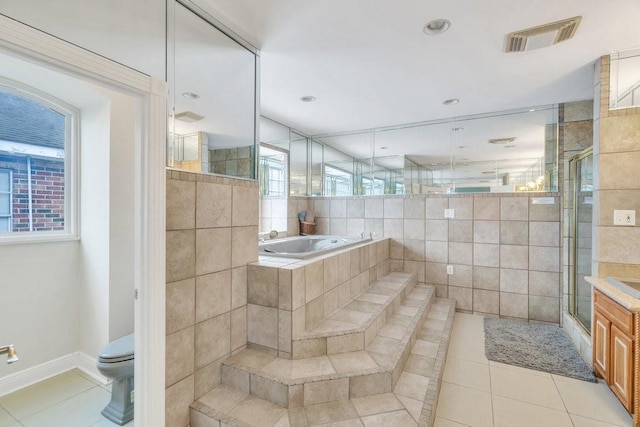 bathroom featuring visible vents, plenty of natural light, and tile patterned floors