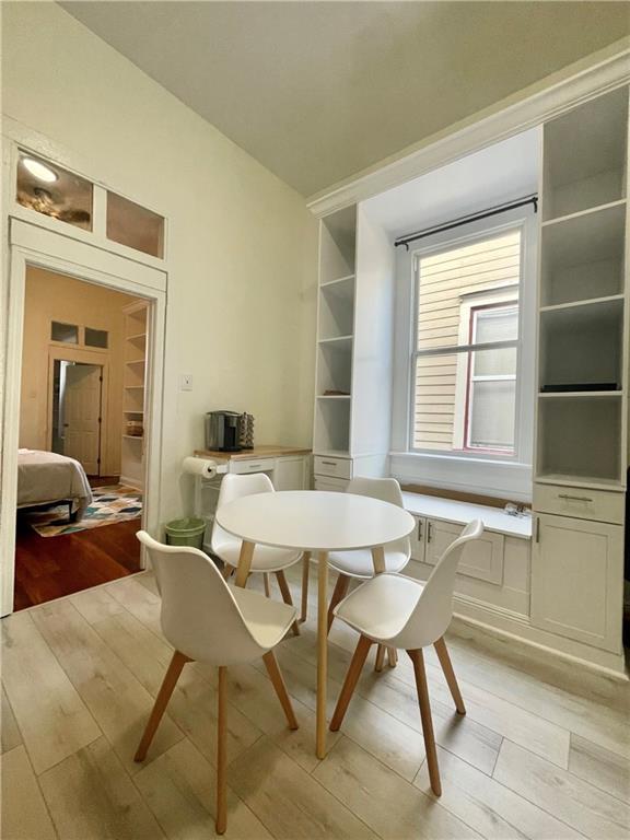 242325 Freret St, New Orleans, LA 70113 - dining space featuring light wood-style floors